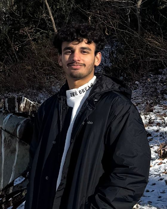 Murtaza Mister outdoors in winter, smiling